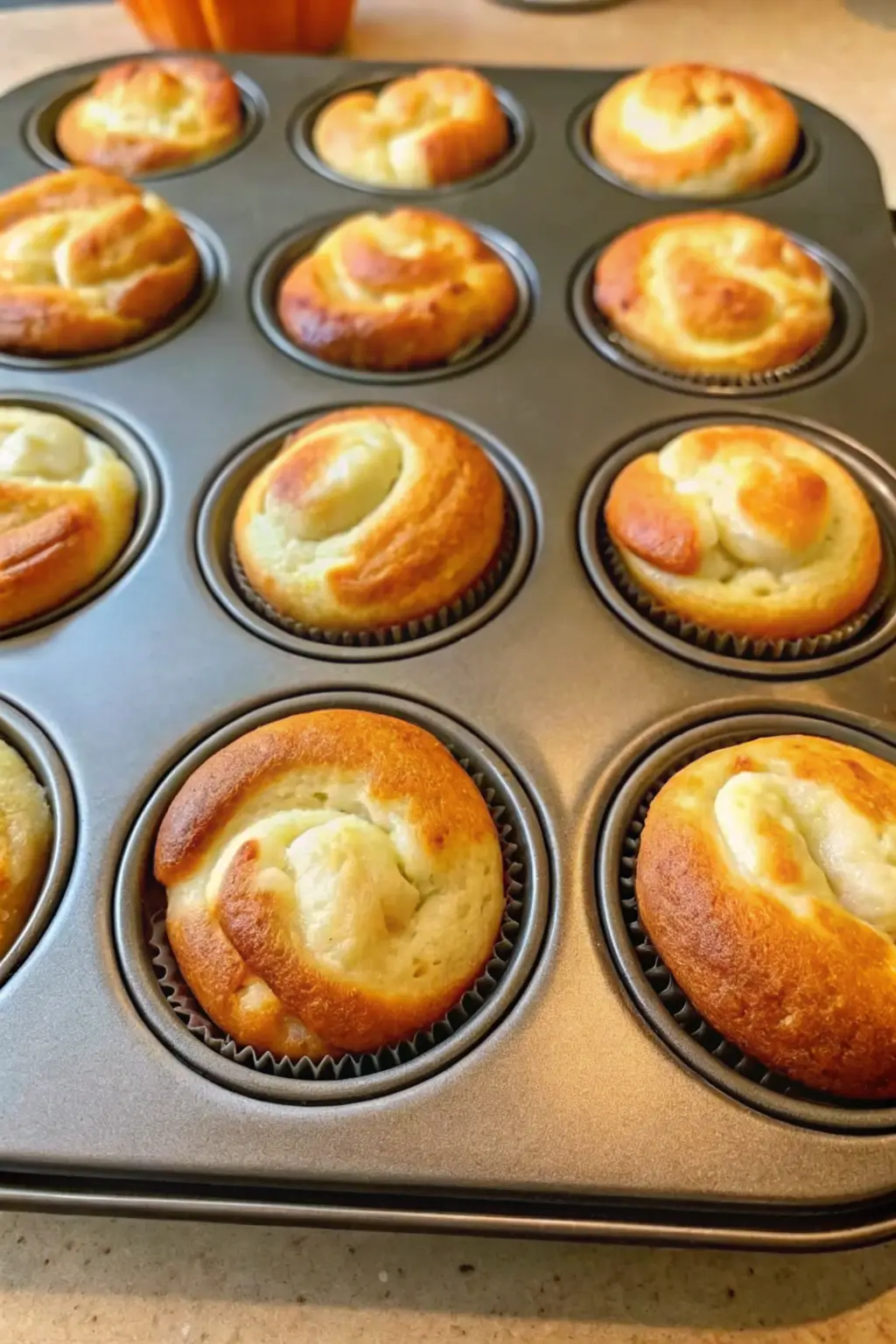 15 pumpkin cream cheese swirl muffins 1