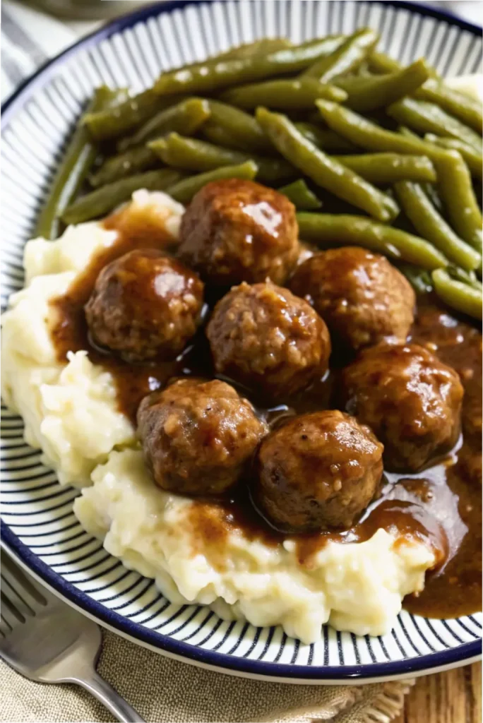 Salisbury Steak Meatballs, a comforting and hearty dish paired with creamy mashed potatoes.