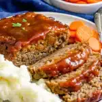 Classic Meatloaf With A Tomato Beef Sauce, a hearty and flavorful family dinner recipe.