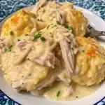 Delicious Crock Pot Chicken and Dumplings, featuring tender chicken and rich, creamy broth.