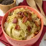Fried Cabbage with Onions and Bacon skillet dish featuring tender cabbage, caramelized onions, and crispy bacon for a delicious comfort food meal.