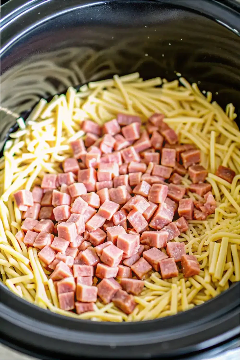 Slow-cooked Crockpot Ham and Potato Casserole, a satisfying and easy-to-make dinner recipe.