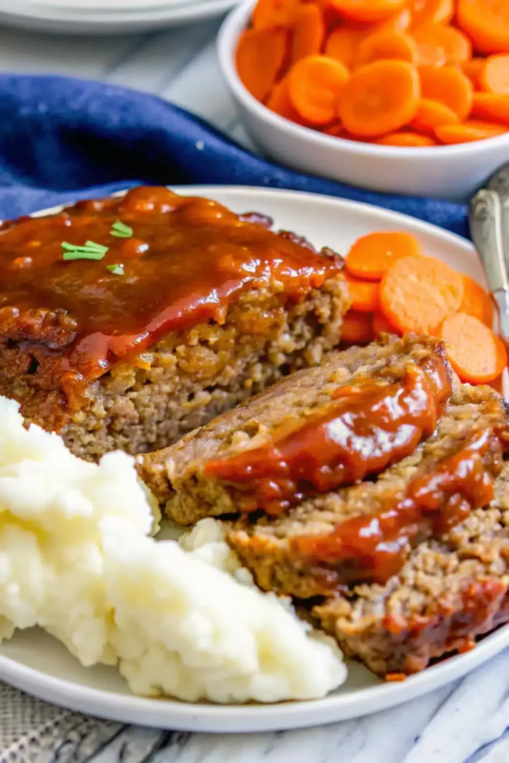 Classic Meatloaf With A Tomato Beef Sauce, a hearty and flavorful family dinner recipe.