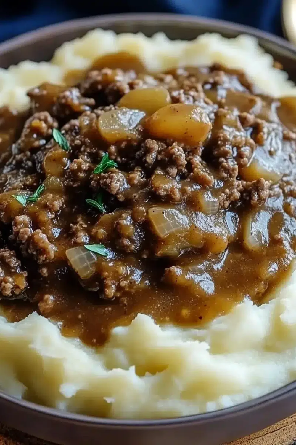 ground beef and gravy over mashed potatoes